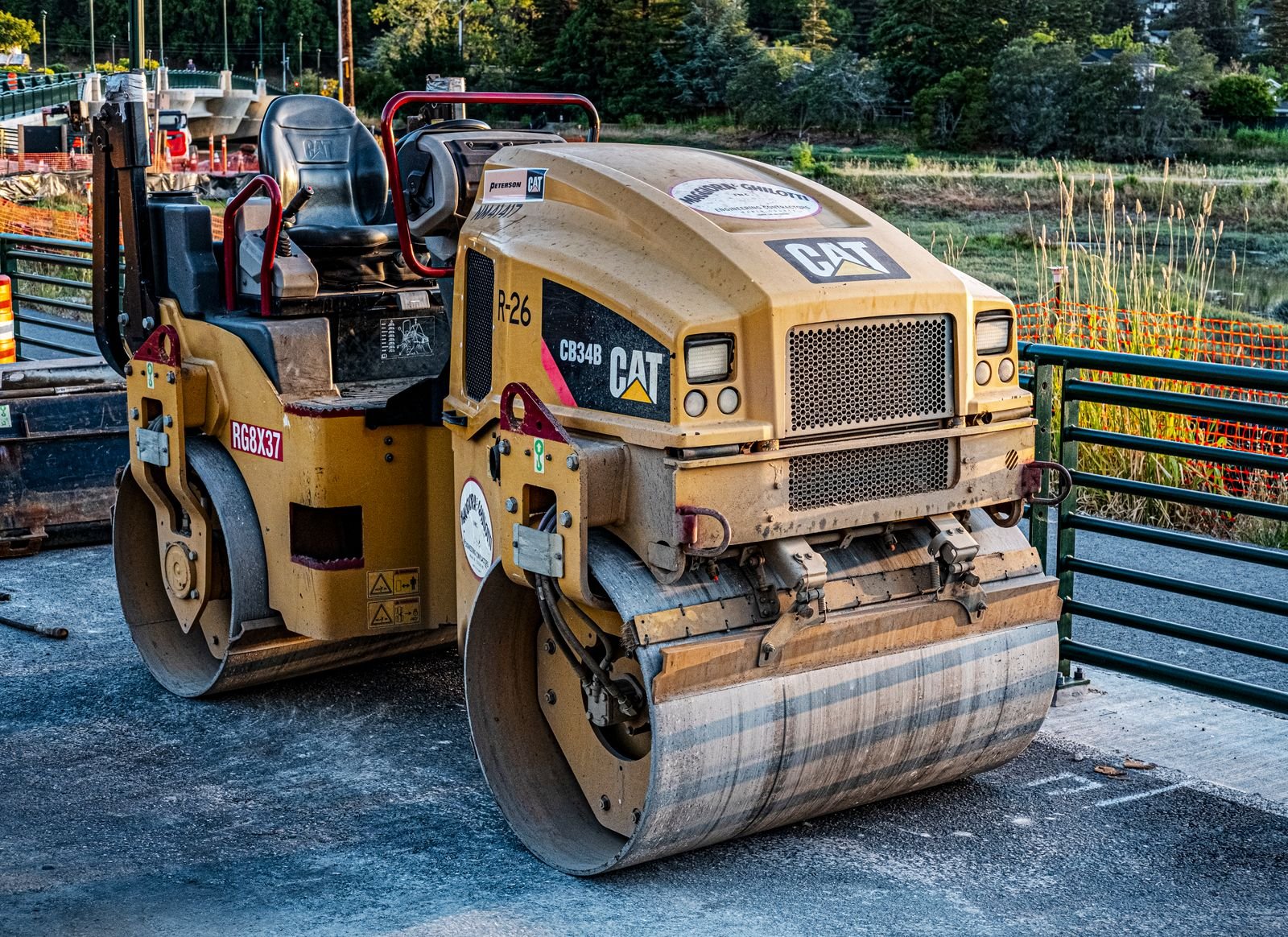 Heavy road roller equipment resurfacing asphalt
